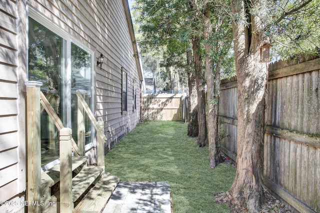 view of yard featuring a fenced backyard