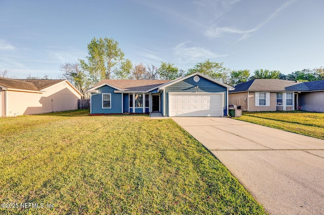 single story home with a garage, driveway, and a front yard