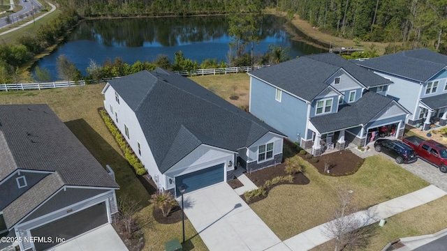 aerial view featuring a water view