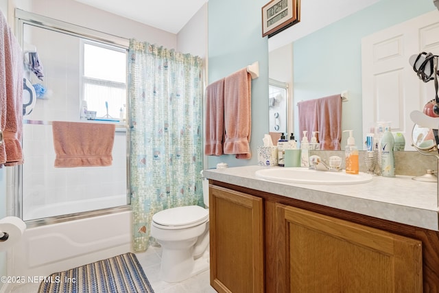 bathroom featuring vanity, toilet, shower / bath combination with glass door, and tile patterned flooring