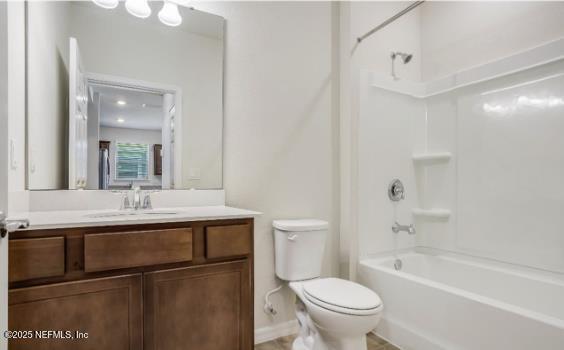 full bathroom with vanity, toilet, and shower / bathing tub combination