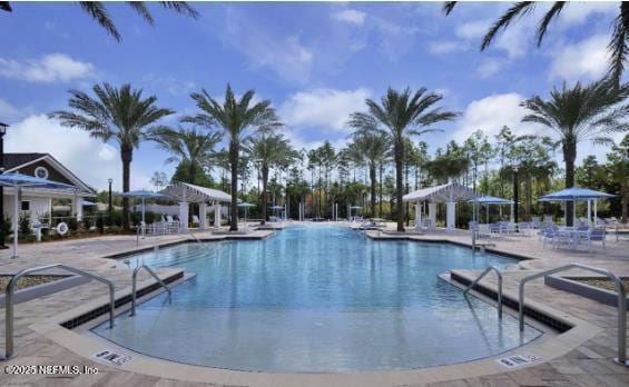 pool with a patio area