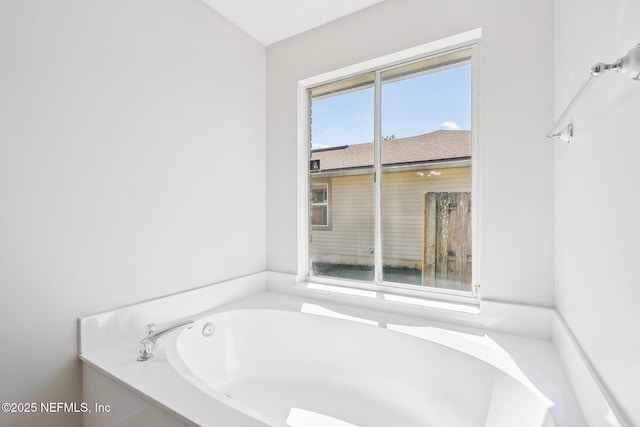 full bathroom with a garden tub