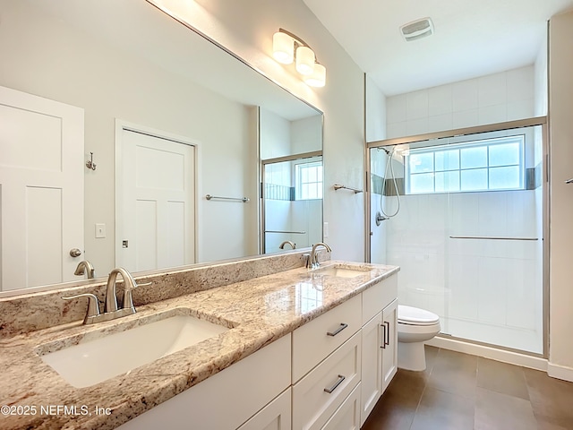 31 Lewis Blvd, Saint Augustine, FL 32084 - full bathroom with a sink, visible vents, toilet, and a shower stall