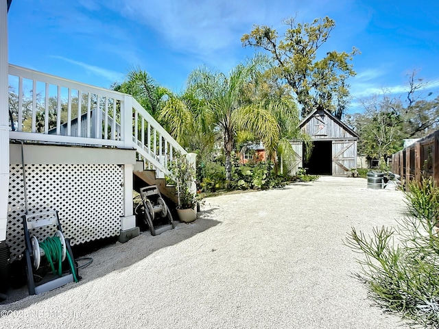 31 Lewis Blvd, Saint Augustine, FL 32084 - exterior space featuring an outbuilding, stairway, and a barn