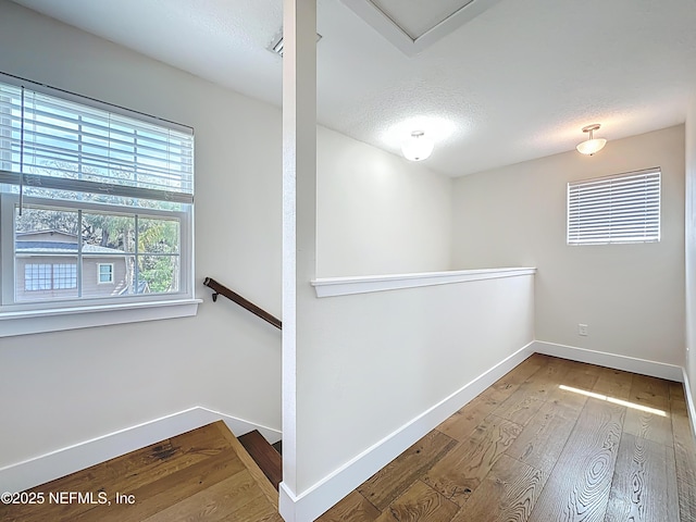 31 Lewis Blvd, Saint Augustine, FL 32084 - interior space featuring a textured ceiling, baseboards, and wood-type flooring