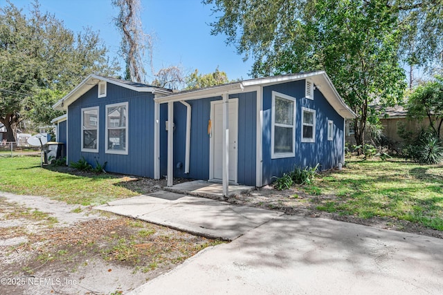 bungalow with a front lawn