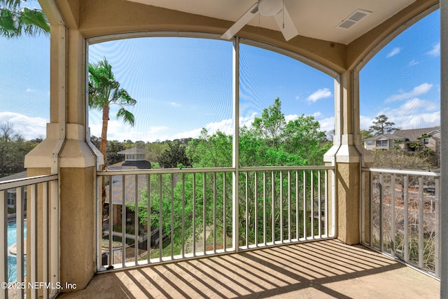 balcony featuring a ceiling fan and visible vents