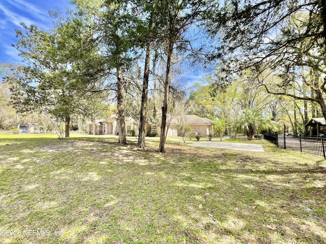 view of yard featuring fence