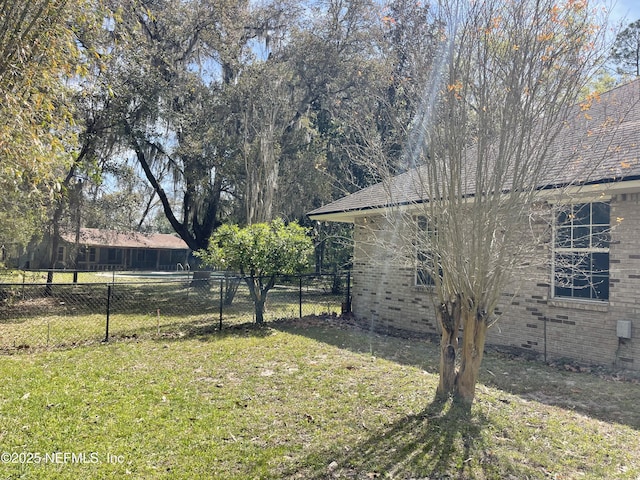 view of yard featuring fence