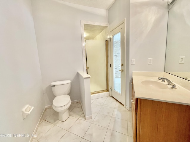 full bathroom with tile patterned flooring, baseboards, toilet, a stall shower, and vanity