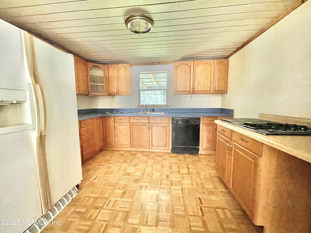 kitchen with glass insert cabinets, black dishwasher, white refrigerator with ice dispenser, gas stovetop, and a sink