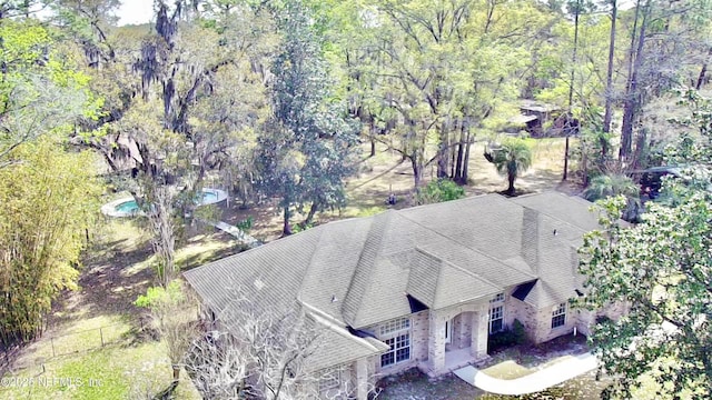 bird's eye view with a forest view