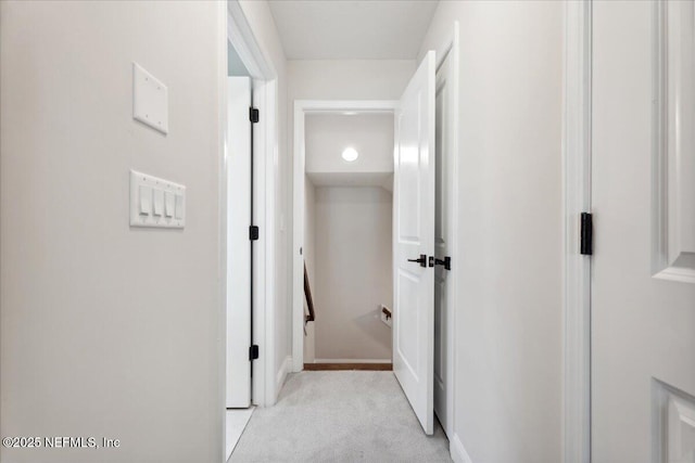 corridor with light carpet