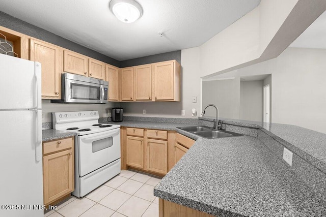 7800 Point Meadows Dr Unit 736, Jacksonville, FL 32256 - kitchen with light brown cabinets, a sink, dark countertops, white appliances, and light tile patterned floors