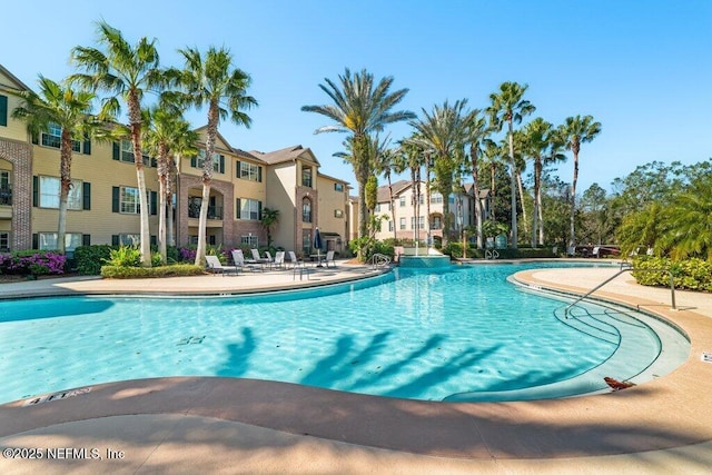 7800 Point Meadows Dr Unit 736, Jacksonville, FL 32256 - community pool with a patio and a residential view