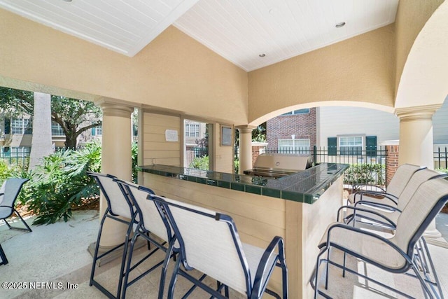 7800 Point Meadows Dr Unit 736, Jacksonville, FL 32256 - view of patio / terrace with outdoor wet bar and area for grilling