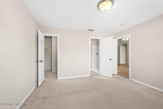 7800 Point Meadows Dr Unit 736, Jacksonville, FL 32256 - unfurnished bedroom with light colored carpet, visible vents, and baseboards
