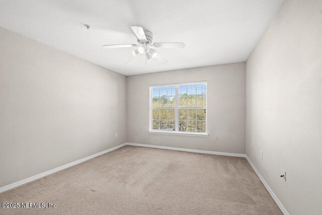 7800 Point Meadows Dr Unit 736, Jacksonville, FL 32256 - unfurnished room featuring baseboards, carpet floors, and ceiling fan