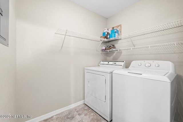 7800 Point Meadows Dr Unit 736, Jacksonville, FL 32256 - laundry area with baseboards, laundry area, and washer and clothes dryer