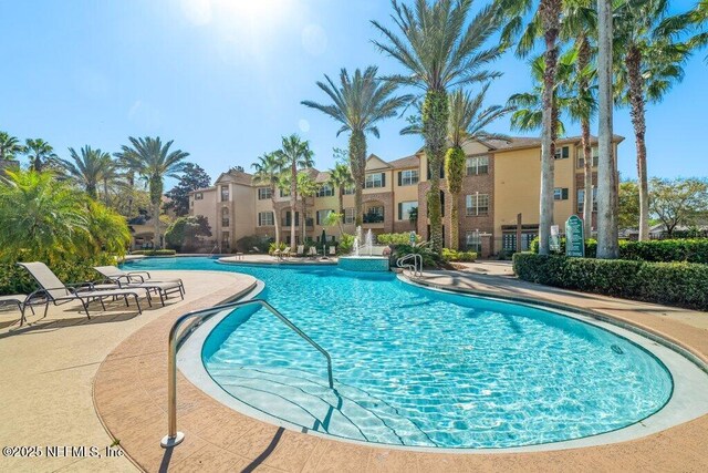 7800 Point Meadows Dr Unit 736, Jacksonville, FL 32256 - pool featuring a patio
