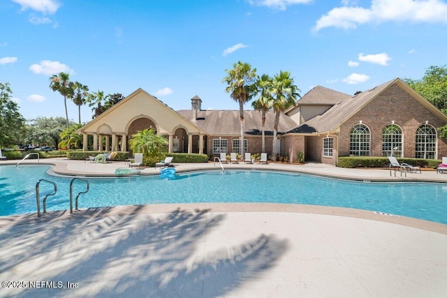 7800 Point Meadows Dr Unit 736, Jacksonville, FL 32256 - community pool with a patio