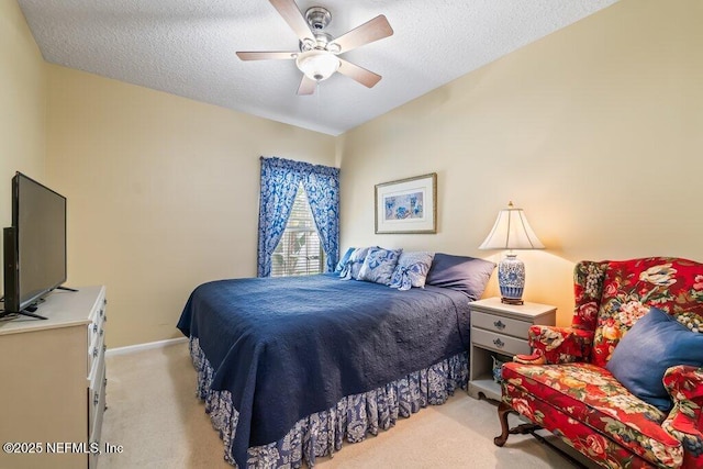 1341 Honeysuckle Dr, Saint Johns, FL 32259 - bedroom with light colored carpet, a textured ceiling, a ceiling fan, and baseboards
