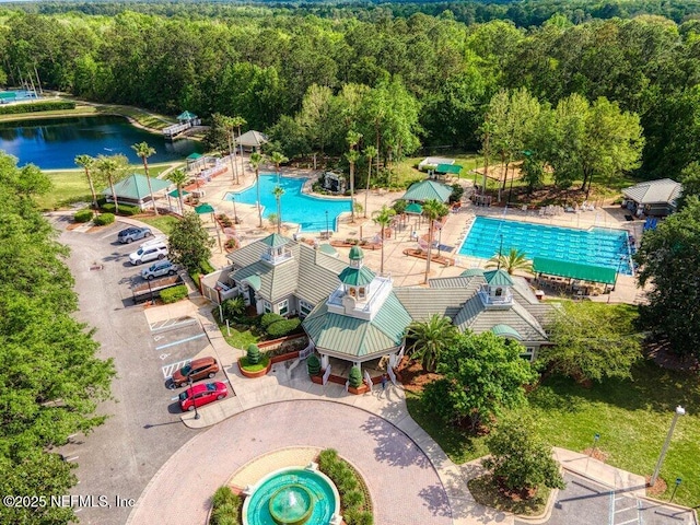 1341 Honeysuckle Dr, Saint Johns, FL 32259 - bird's eye view of a pool area, a heavily wooded area, and a large body of water