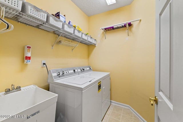 1341 Honeysuckle Dr, Saint Johns, FL 32259 - laundry room with independent washer and dryer, baseboards, and light tile patterned flooring