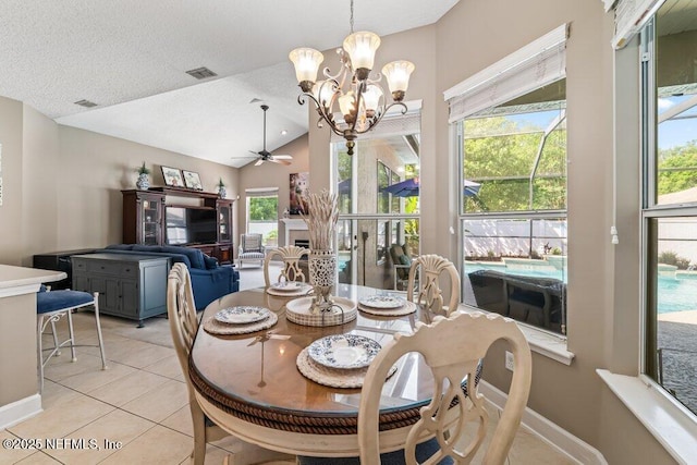 1341 Honeysuckle Dr, Saint Johns, FL 32259 - dining room featuring ceiling fan, light tile patterned flooring, plenty of natural light, a chandelier, and vaulted ceiling