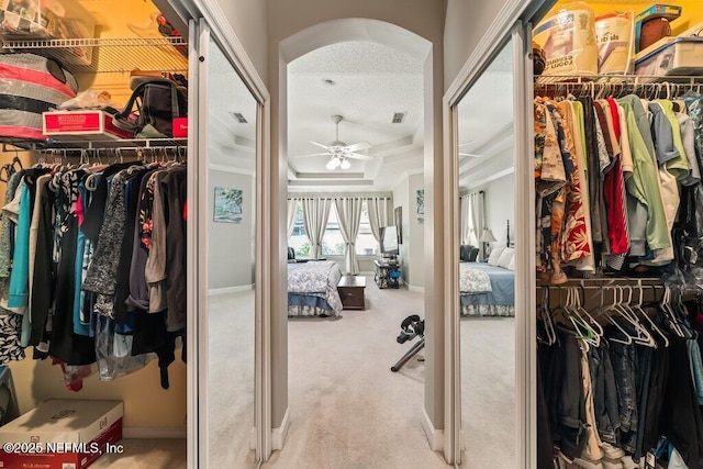 1341 Honeysuckle Dr, Saint Johns, FL 32259 - spacious closet with carpet, ceiling fan, and arched walkways