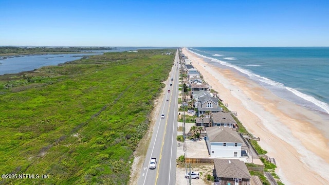aerial view with a beach view and a water view