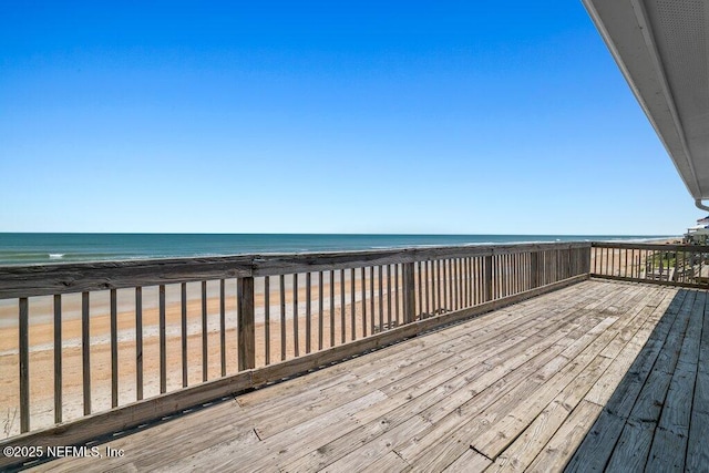 deck featuring a water view