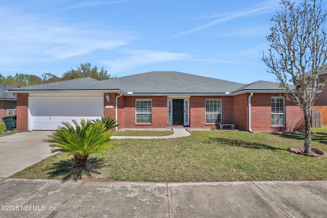 ranch-style home with a front yard, brick siding, a garage, and driveway