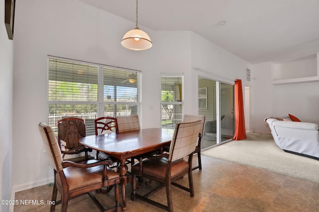 view of carpeted dining area