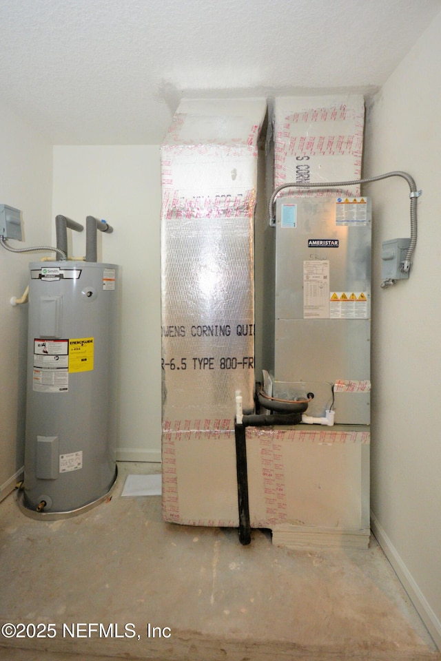 utility room featuring electric water heater