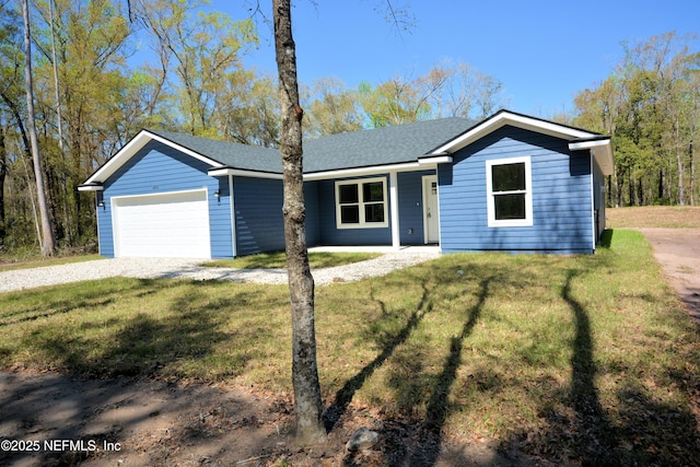 single story home with driveway, a front lawn, and a garage