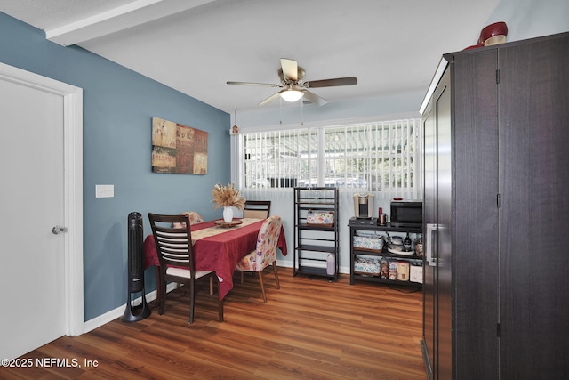 office area with baseboards, ceiling fan, and wood finished floors