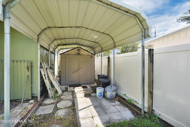 view of shed with fence