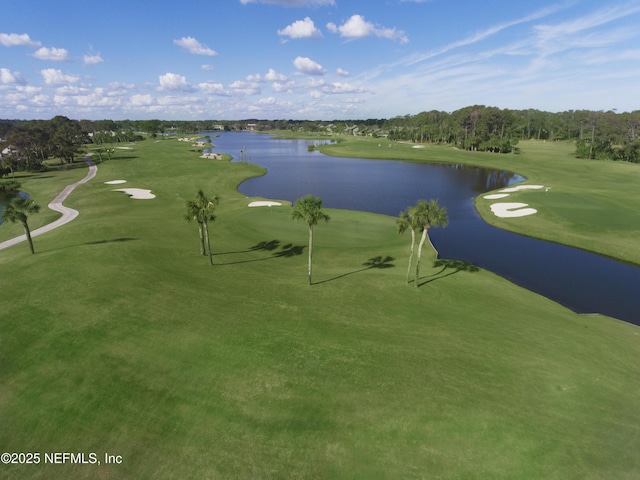 exterior space featuring a water view and view of golf course