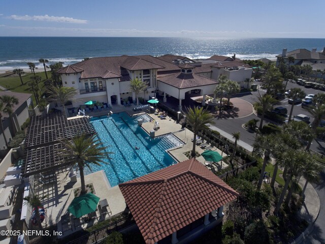 bird's eye view featuring a water view and a residential view