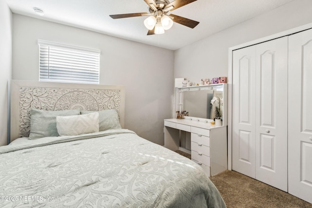 carpeted bedroom featuring a ceiling fan and a closet