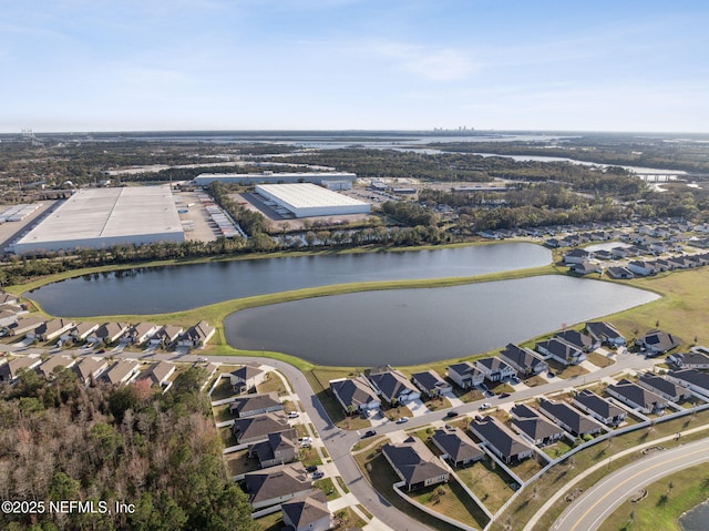 bird's eye view with a residential view and a water view