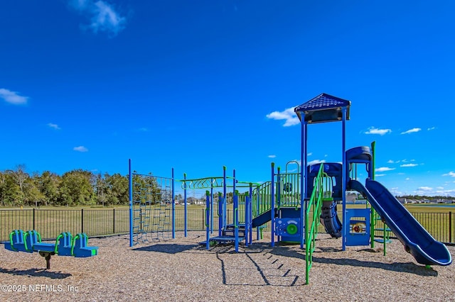 community jungle gym with fence