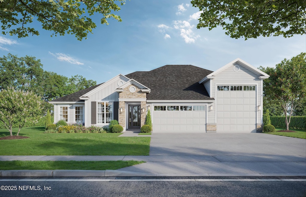 view of front facade featuring a front yard, roof with shingles, a garage, stone siding, and driveway