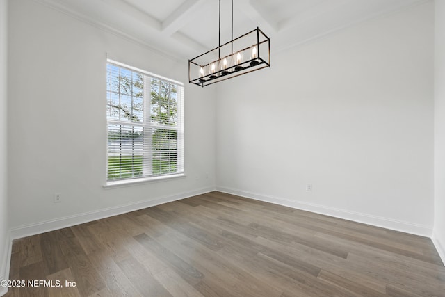 1646 County Road 315b, Green Cove Springs, FL 32043 - unfurnished dining area with a chandelier, baseboards, wood finished floors, beam ceiling, and coffered ceiling