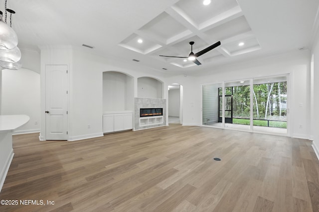 1646 County Road 315b, Green Cove Springs, FL 32043 - unfurnished living room featuring a fireplace, ceiling fan, visible vents, and light wood finished floors