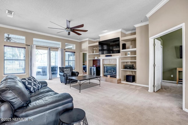 carpeted living room featuring a textured ceiling, a ceiling fan, and a healthy amount of sunlight