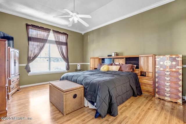 bedroom with light wood-style flooring, a ceiling fan, baseboards, and ornamental molding