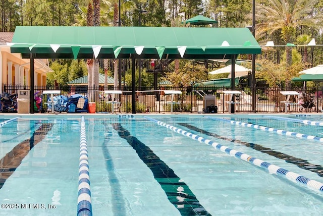 pool featuring fence